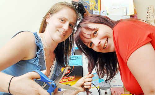 Kelly Schutt and Cindy Herbert will shave their heads on December 4 to raise money to help a girlfriend recover from brain surgery. Kelly Schutt and Cindy Herbert will shave their heads on December 4 to raise money to help a girlfriend recover from brain surgery.